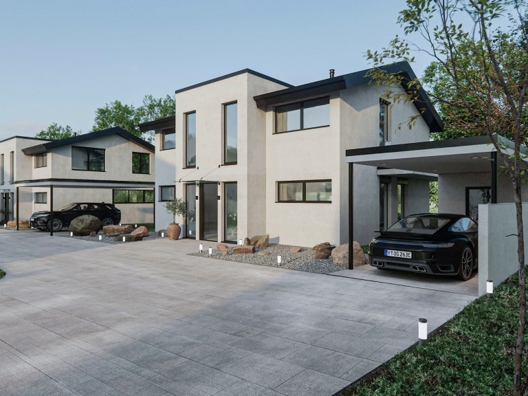 Modernes Haus mit Parkplatz und Carport in ruhiger Umgebung.